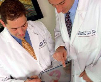 Dr. Kurzer and Dr. Simon consult